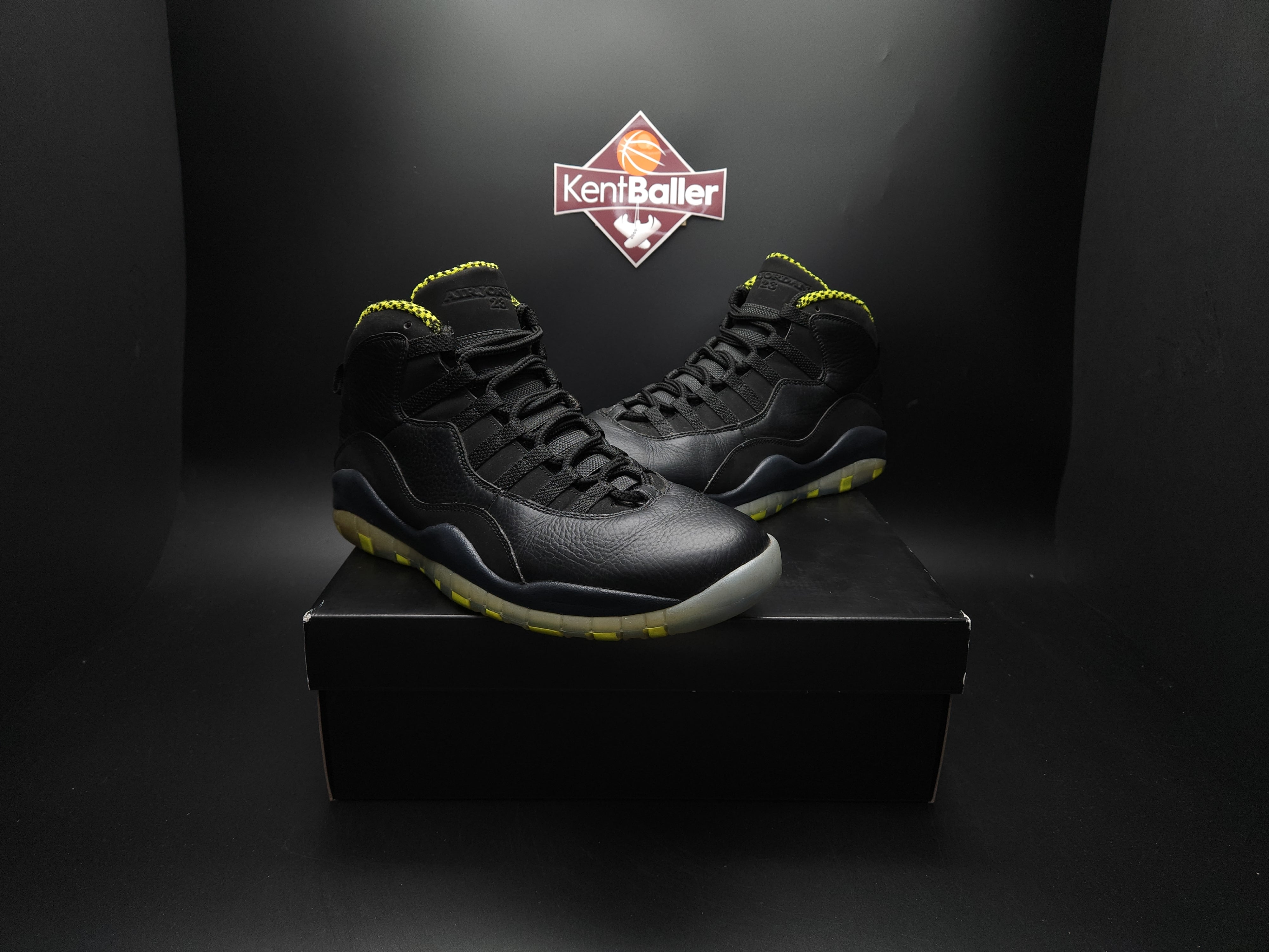 black and yellow jordan 10s